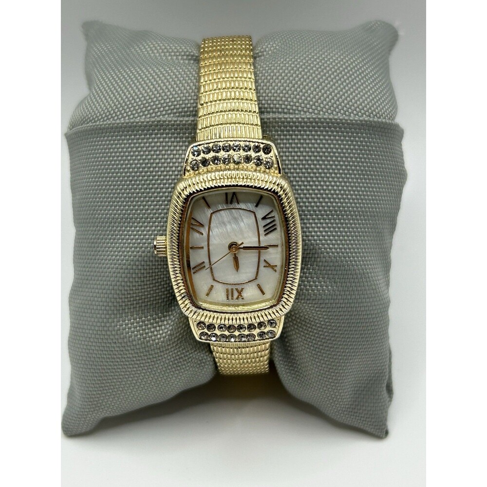 Accutime Women’s Gold Tone Watch Mother of Pearl Dial Rhinestone Bezel Running